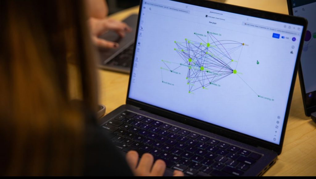 student computer showing network graph